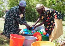 African Women Washing Dishes